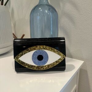 Kurt Geiger Black and Gold Eye Clutch